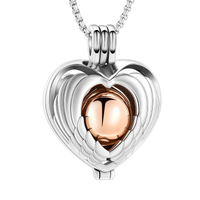 Winged Heart Orb Pendant Rose Gold Tone